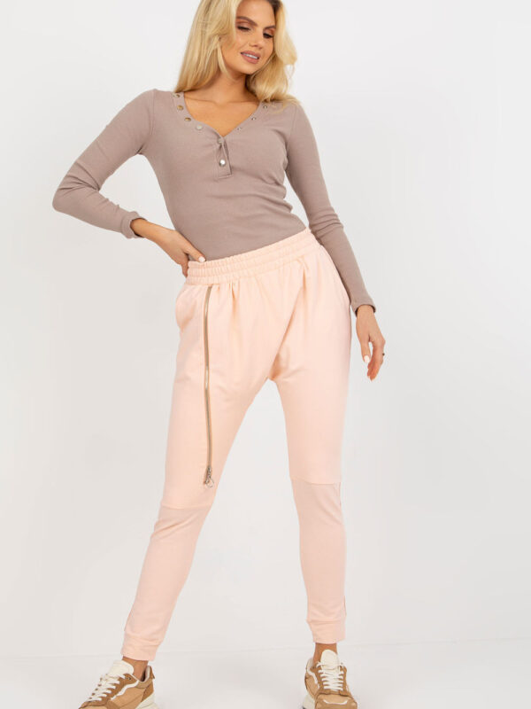 Spodnie Dresowe Model EM-DR-ES-21-558.10 Brzoskwinia - Ex Moda